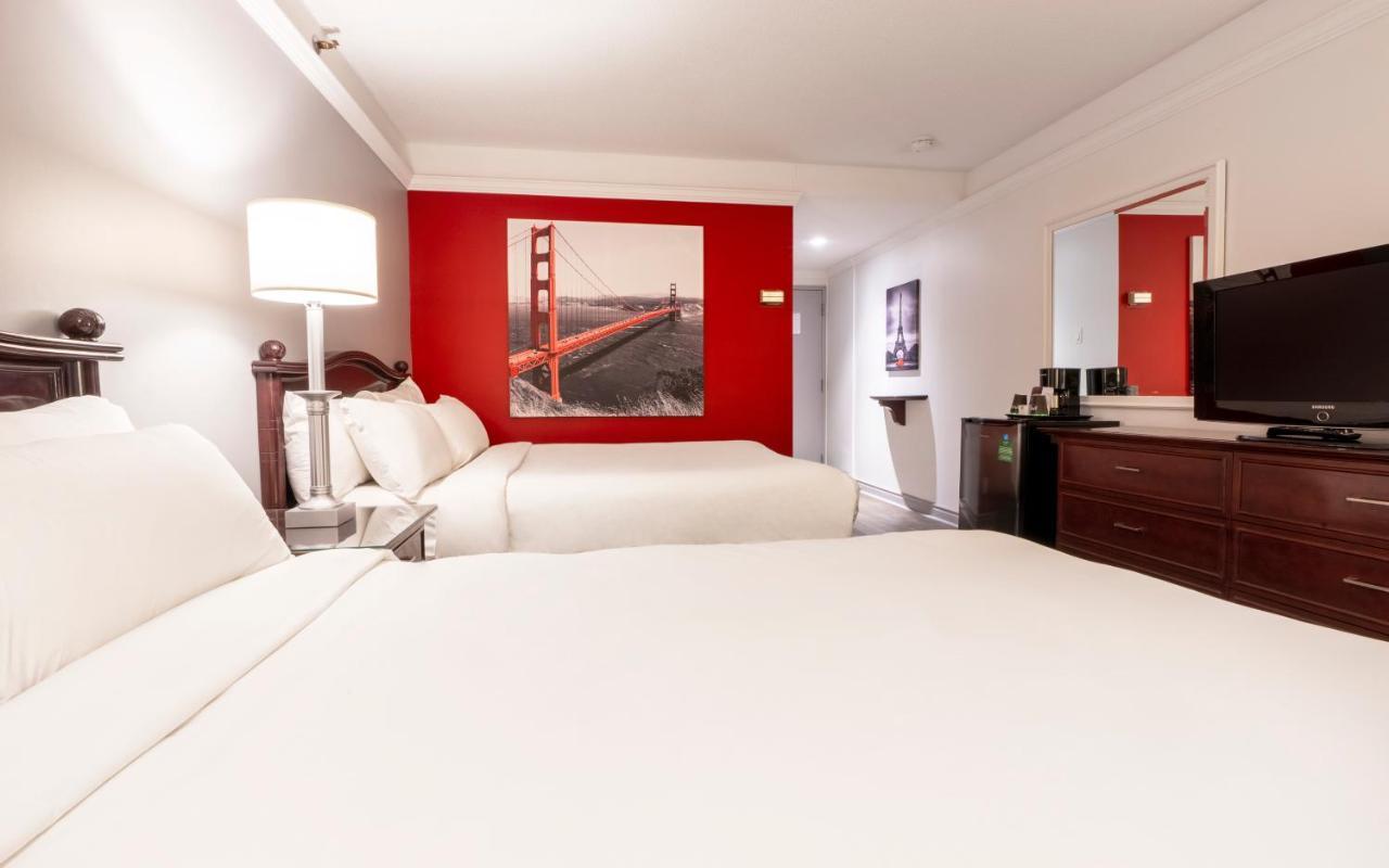 Chambre Traditionnelle avec 2 Lits Doubles et Terrasse Intérieure - Côté Piscine