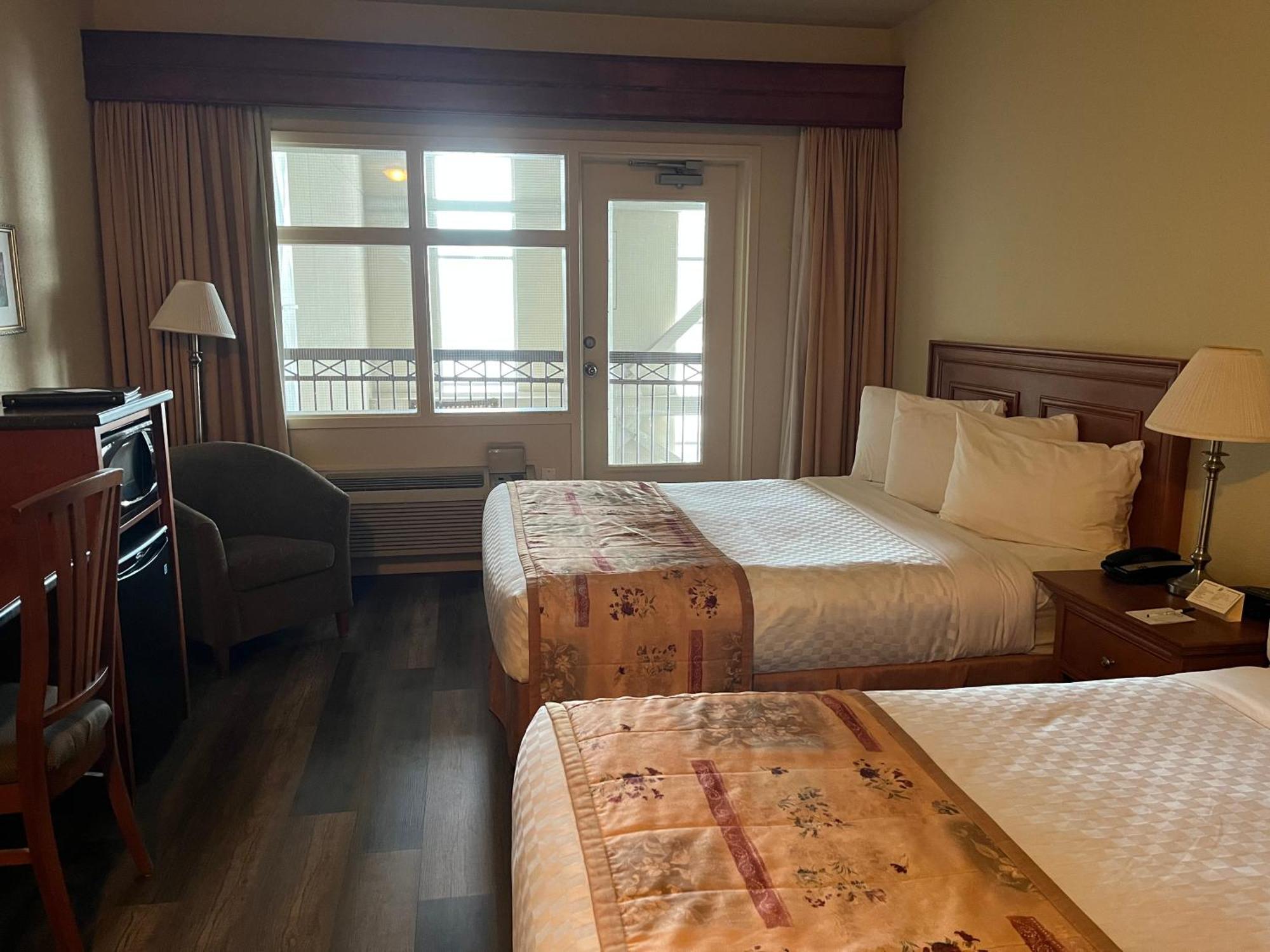 Queen Room with Two Queen Beds - Interior Pool View,1758335127:JPEG