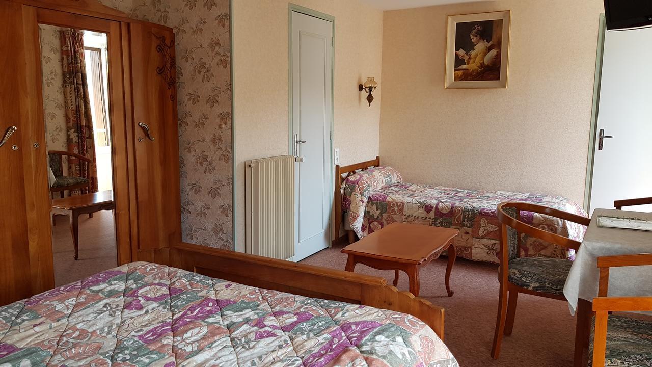 Chambre Triple - Vue sur Ville